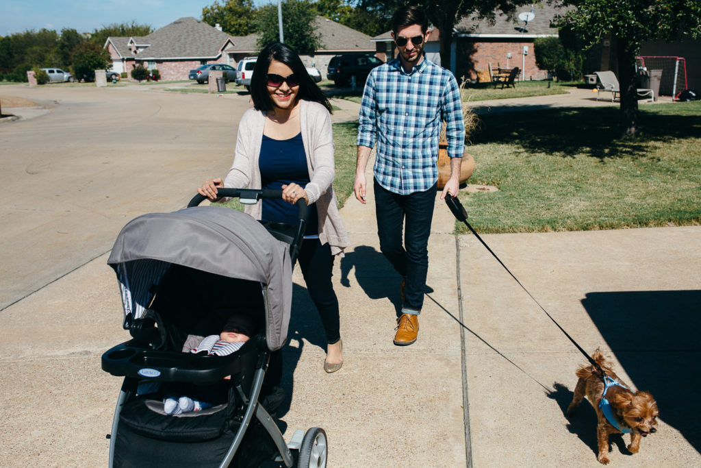 Taking the dog for a walk with the new baby.