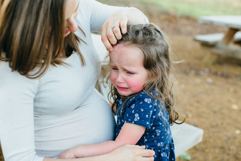 mommy comforting daughter