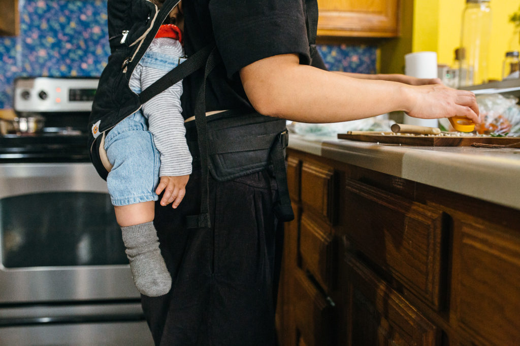 baby sleeping in the baby carrier