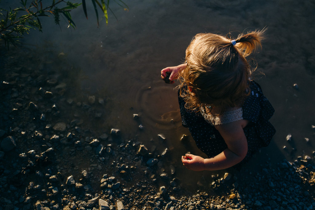 child playing in the water