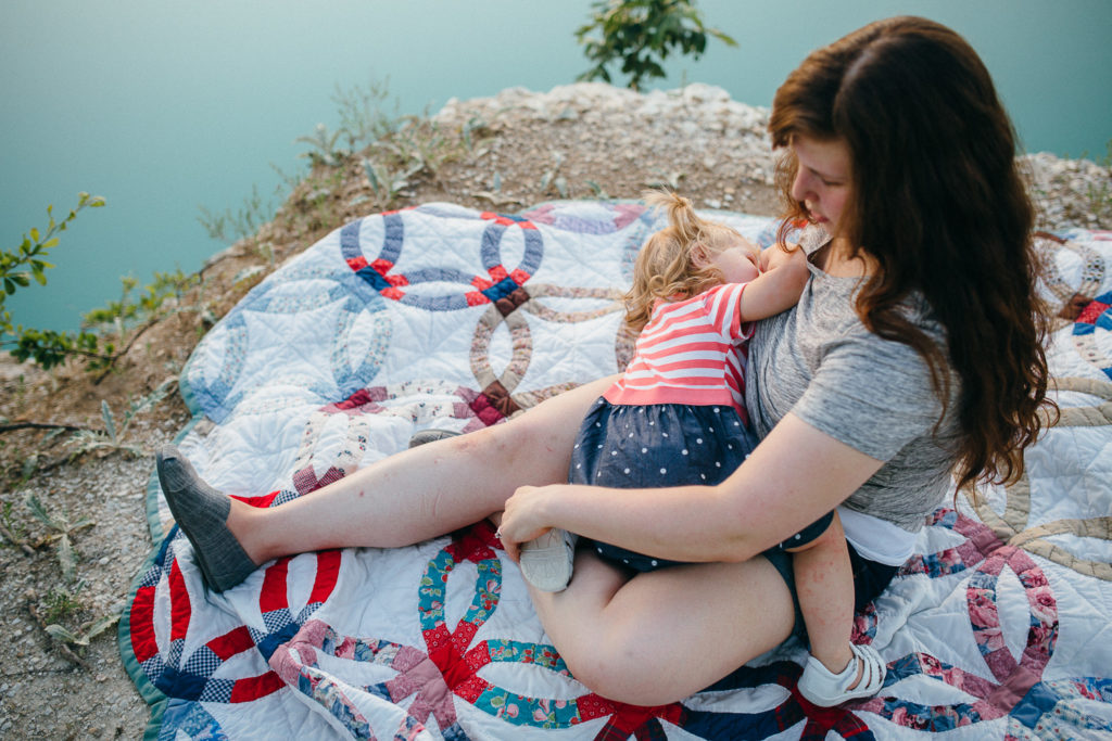 mother nursing toddler