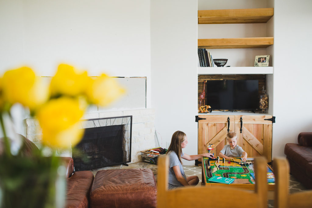 mother and son playing with toys