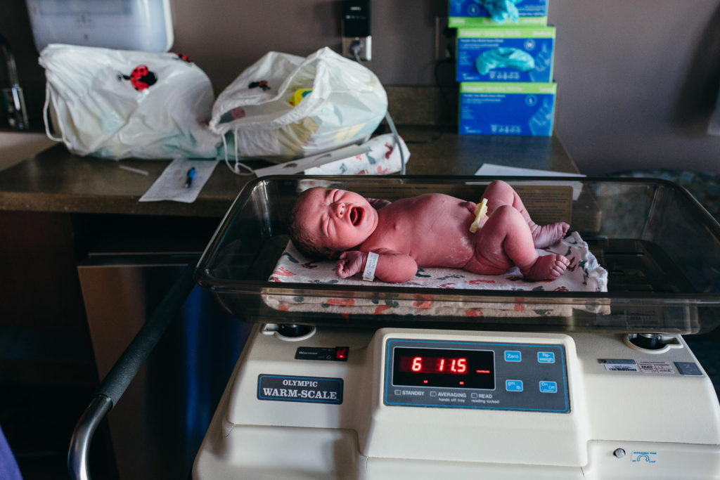 twins getting weighed