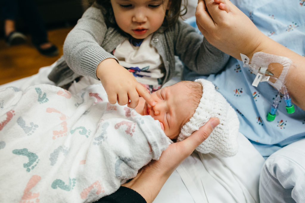 big sister with baby brother