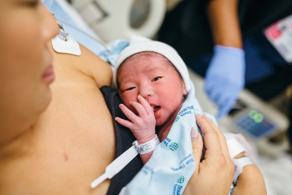 newborn sucking thumb