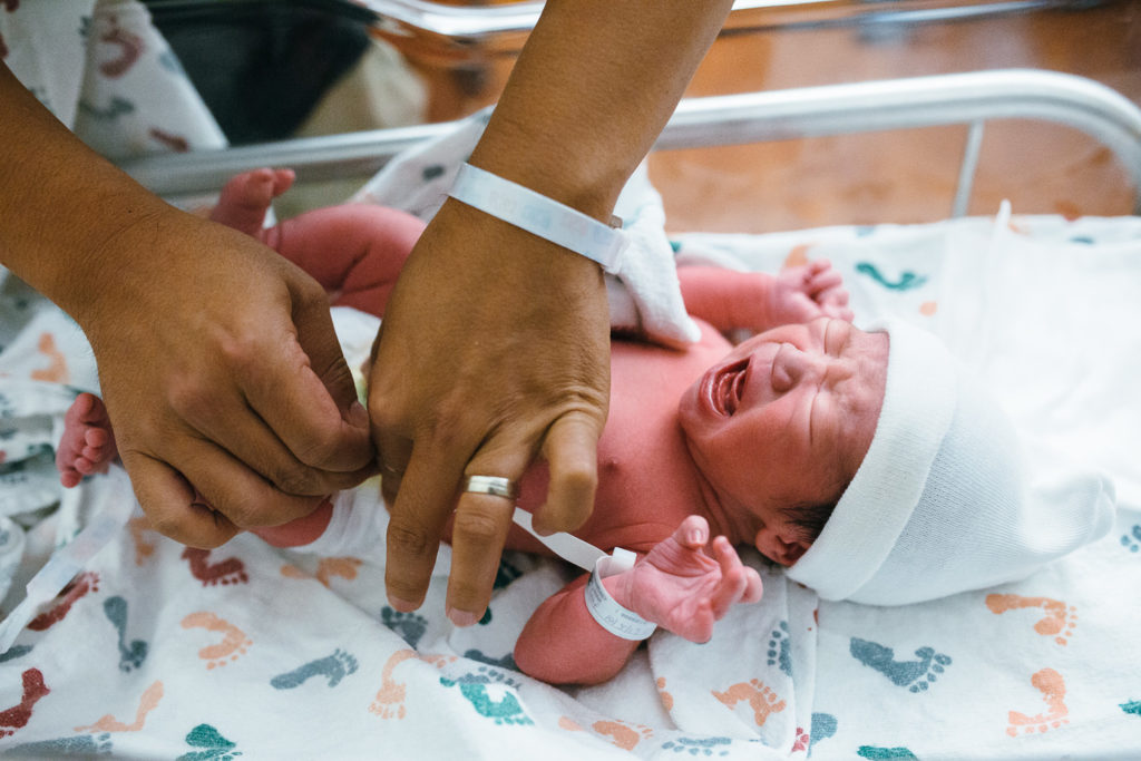 daddy changing diaper for the first time