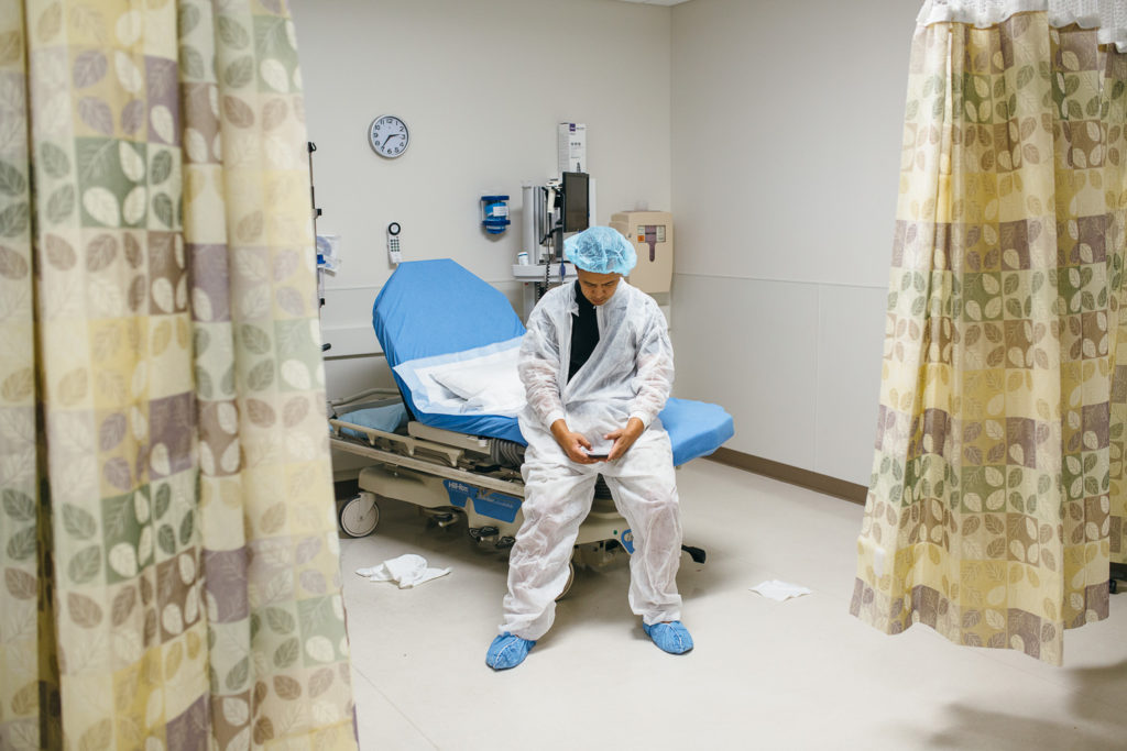 father waiting for c-section