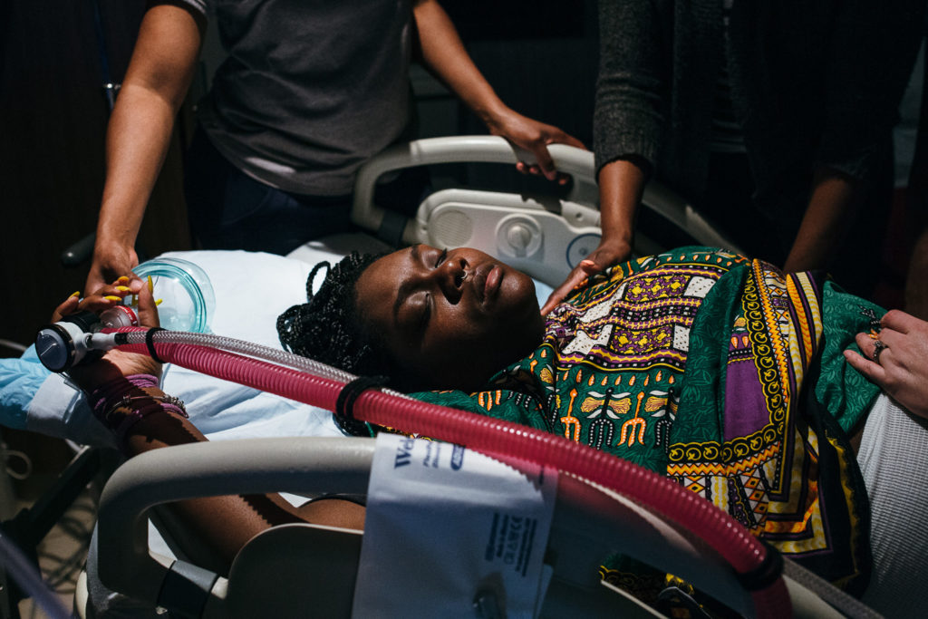 Woman laboring in hospital