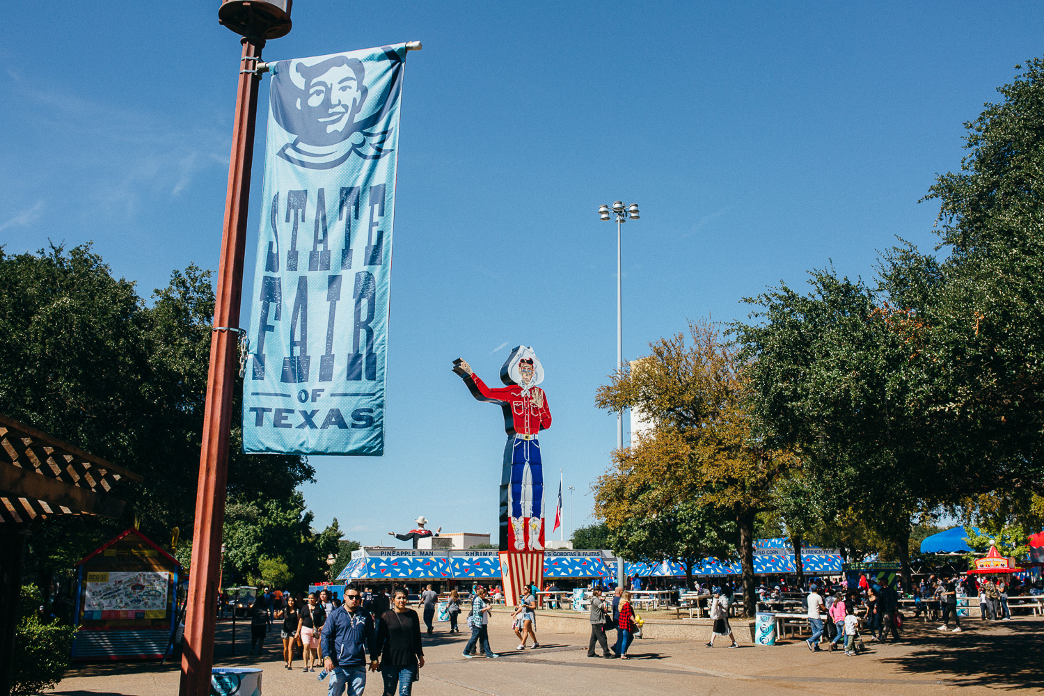 big tex with state fair of texas banner