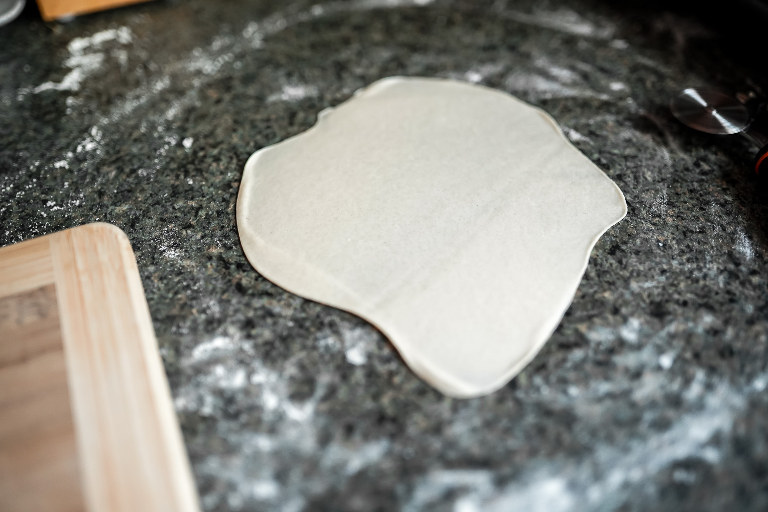 rolling out tortillas